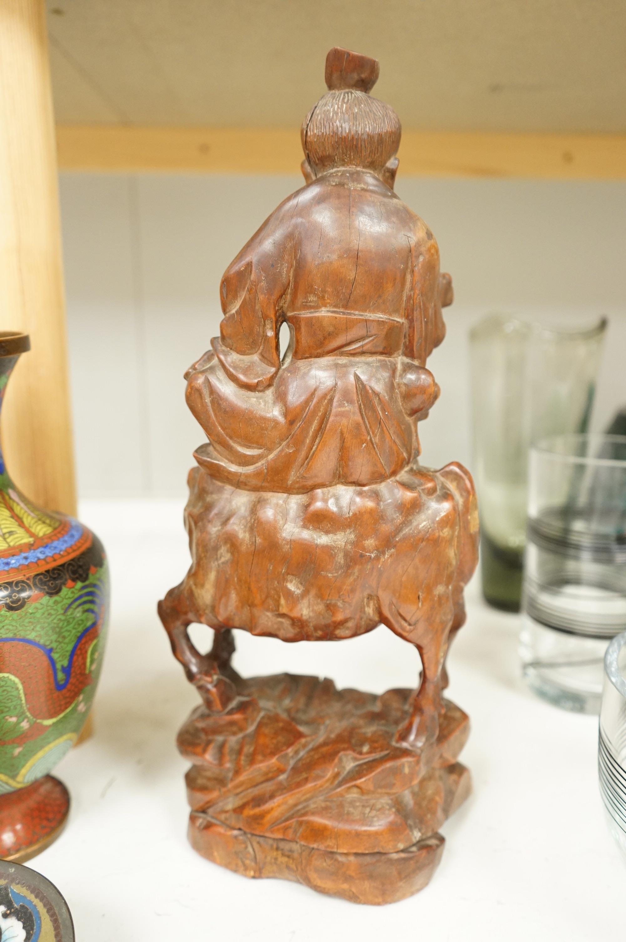 A Japanese cloisonné enamel dish, a Chinese cloisonné enamel vase and three Chinese carved wood figures, largest 39cm high